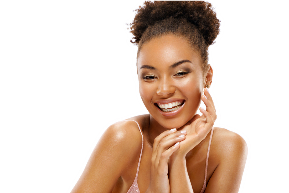 Woman wearing a high puff natural hairstyle, a simple 5-minute styling option for busy mornings and low-maintenance routines.