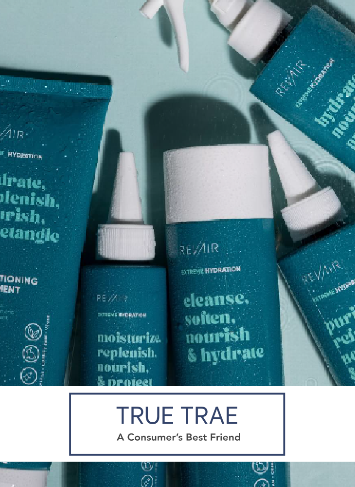 Multiple RevAir Extreme Hydration products including the Deep Conditioning Treatment, Hydrating Leave-In Conditioning Spray, and Cleansing Oil Shampoo arranged on a light blue surface, with the TrueTrae logo displayed below